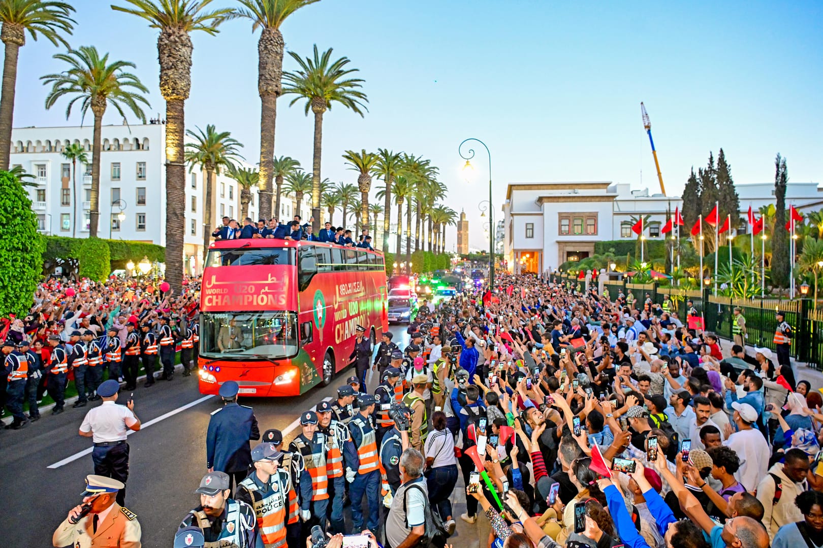Crowds cheer as Morocco’s U20 World Cup champions parade through Rabat.