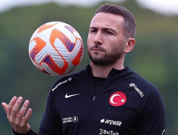 Vural Durmuş, athletic performance coach for Galatasaray and the Turkish National Team, holding a football during training.