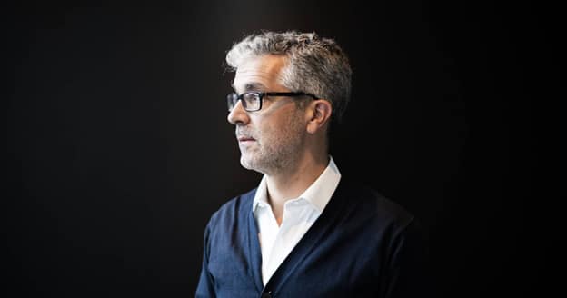 Rui Lanca Rui Lança, Executive Director at Al-Ittihad Club, in profile view against a black background.