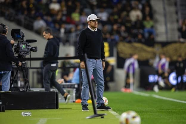 Ryan Martin Ryan Martin, head coach of Loudoun United FC, standing on the touchline during a match.