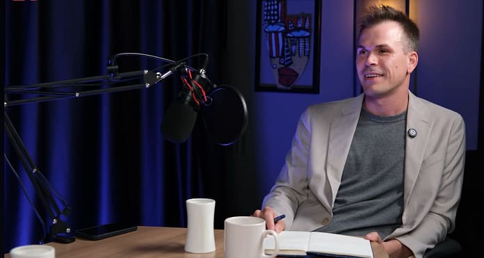 Okan Ozkan 2 Okan Özkan during an interview, reflecting on his career from youth coaching to football executive roles at Fenerbahçe.