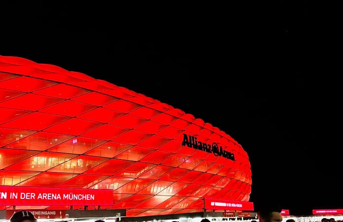 Allianz Arena Night Allianz Arena illuminated in red at night in Munich, Germany.