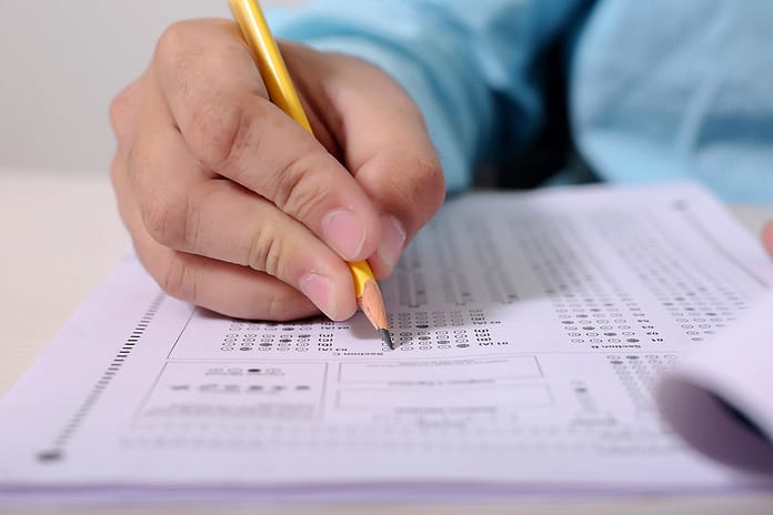 a men giving fifa agent exam