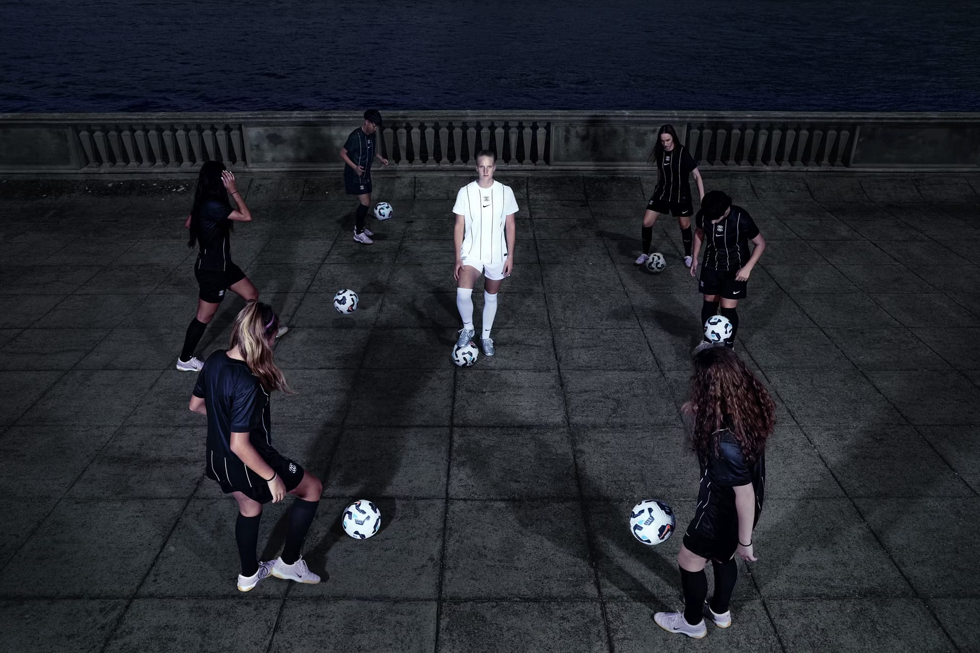 F.C. Como Women players wearing the 2025/26 Home kit during a promotional shoot for The Next Wave campaign.